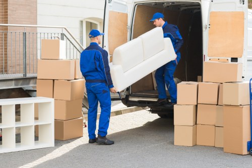 Household furniture and boxes organised for transport in a Redbridge removal