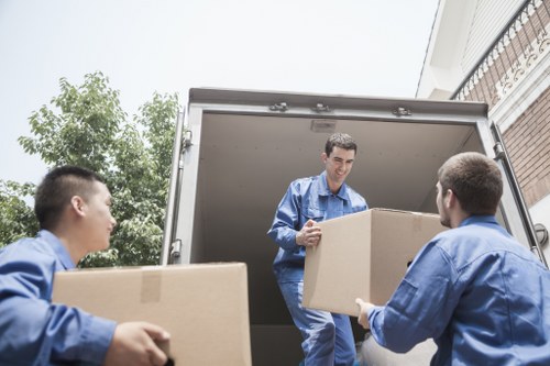 Moving checklist and packed boxes prepared for a house removal in Redbridge