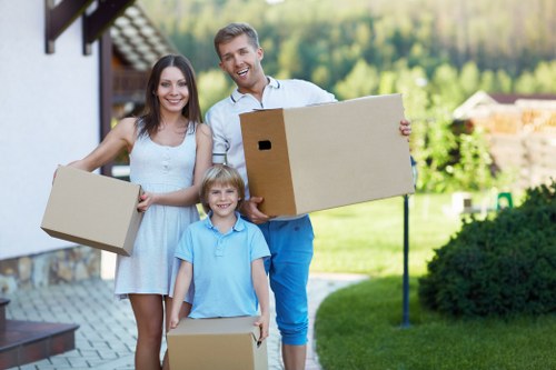 Removals team planning a move in a Redbridge residential street