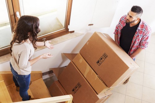 Unpacking boxes into a new Redbridge property to help the customer settle in faster