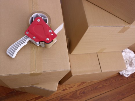 Furniture and boxes prepared for transport by a man with van in Redbridge