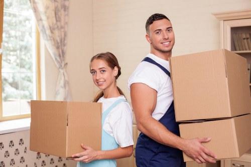 Careful wrapping and labelling of fragile household items during a Redbridge packing service