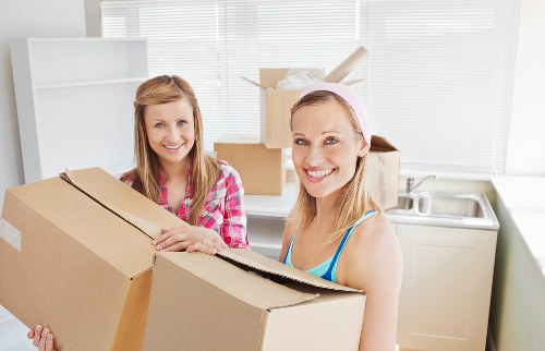Packed boxes and furniture ready for transport in Redbridge
